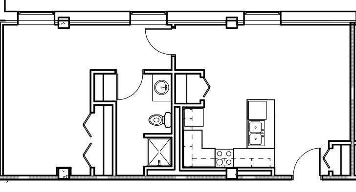 A floor plan of an apartment featuring a bathroom and kitchen.