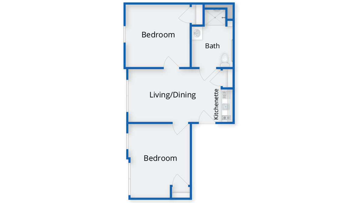 Floor plan of a two-bedroom apartment with a living/dining area, kitchen, and bathroom.