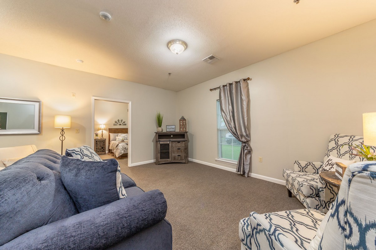 A cozy living room with comfortable seating and stylish decor.
