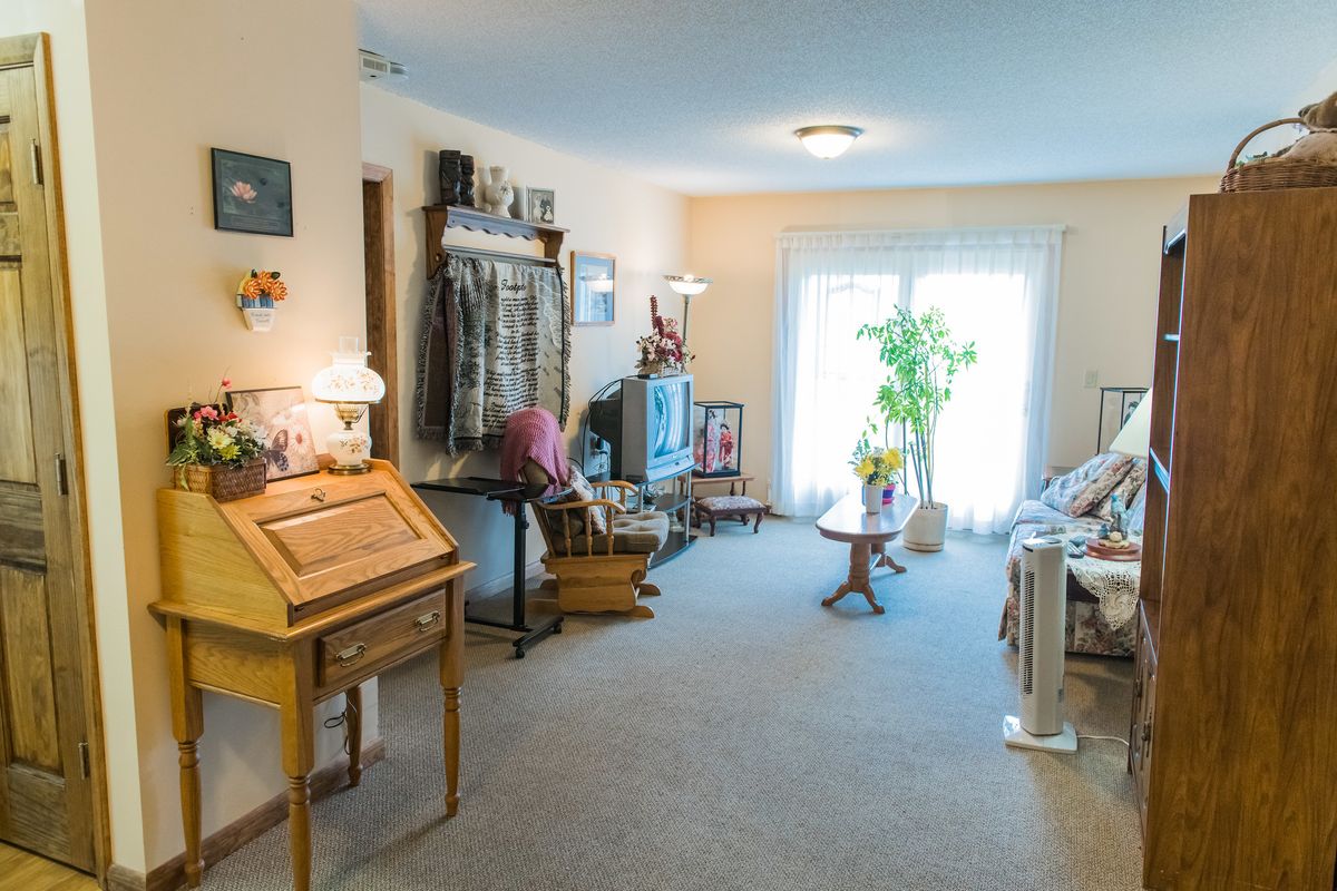 A cozy living room with vintage decor and natural lighting.