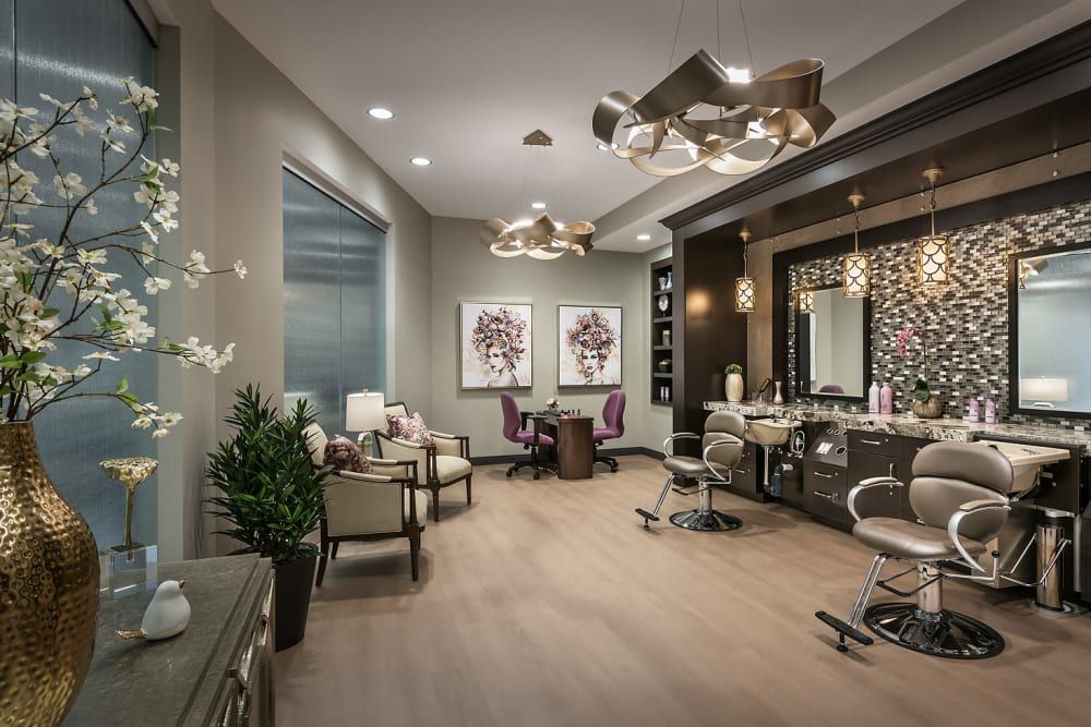 A modern and stylish salon interior with elegant decor and lighting.