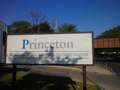 Sign for the Princeton Health Care Center on a clear day.