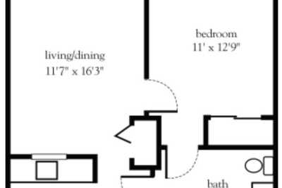 A floor plan showing the layout of an apartment with living/dining area, bedroom, and bathroom.