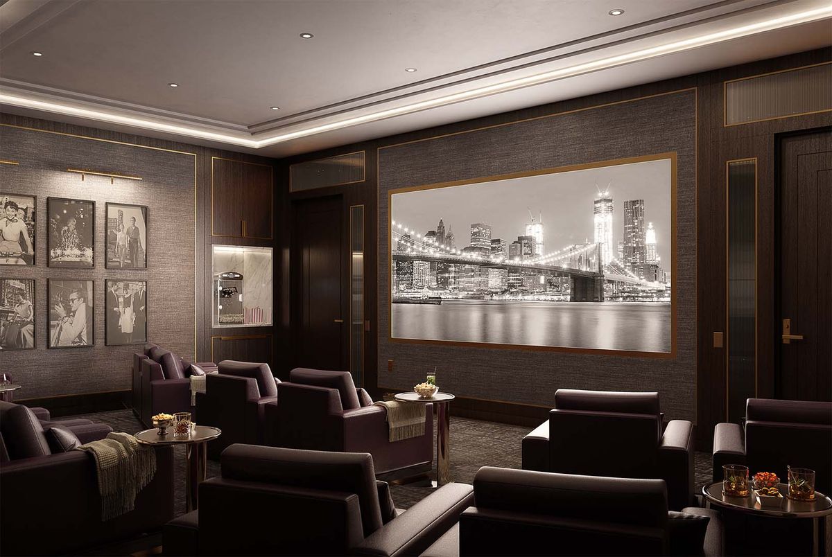 A luxurious home theater room with comfortable seating and a large projector screen displaying a black and white cityscape.