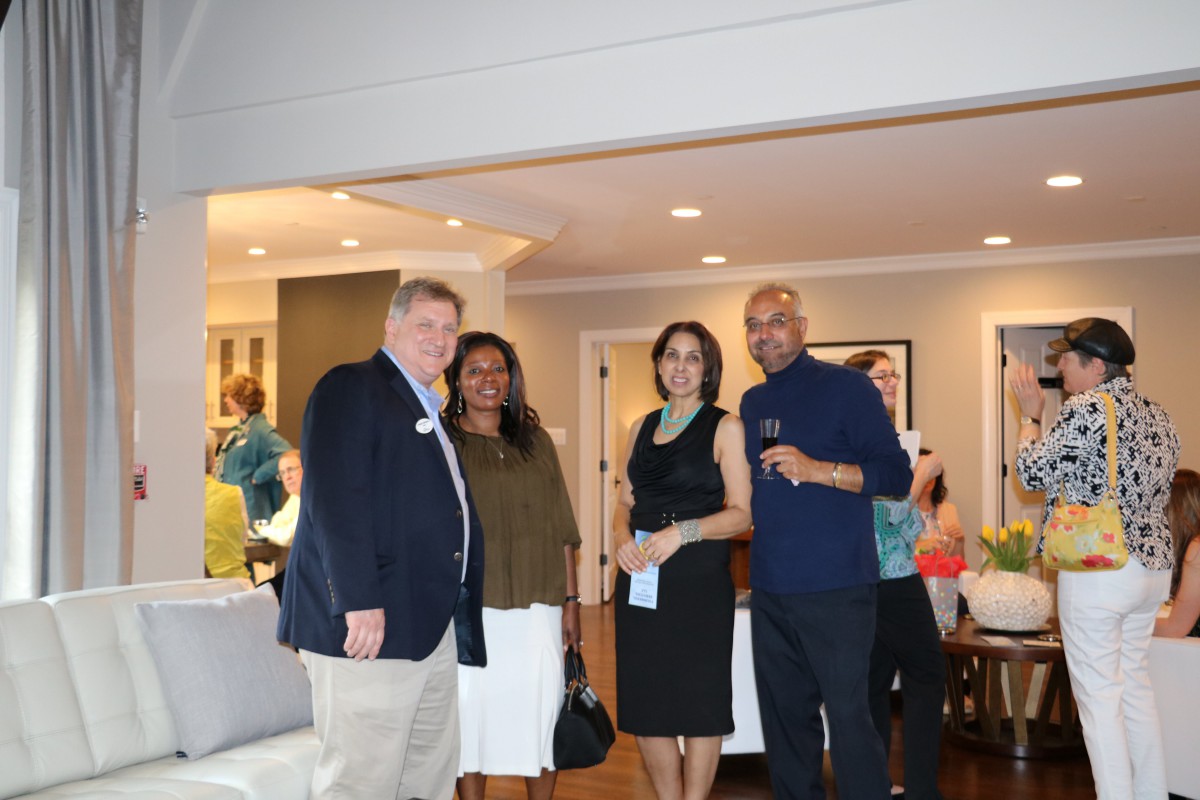 A group of people attending a social event indoors.
