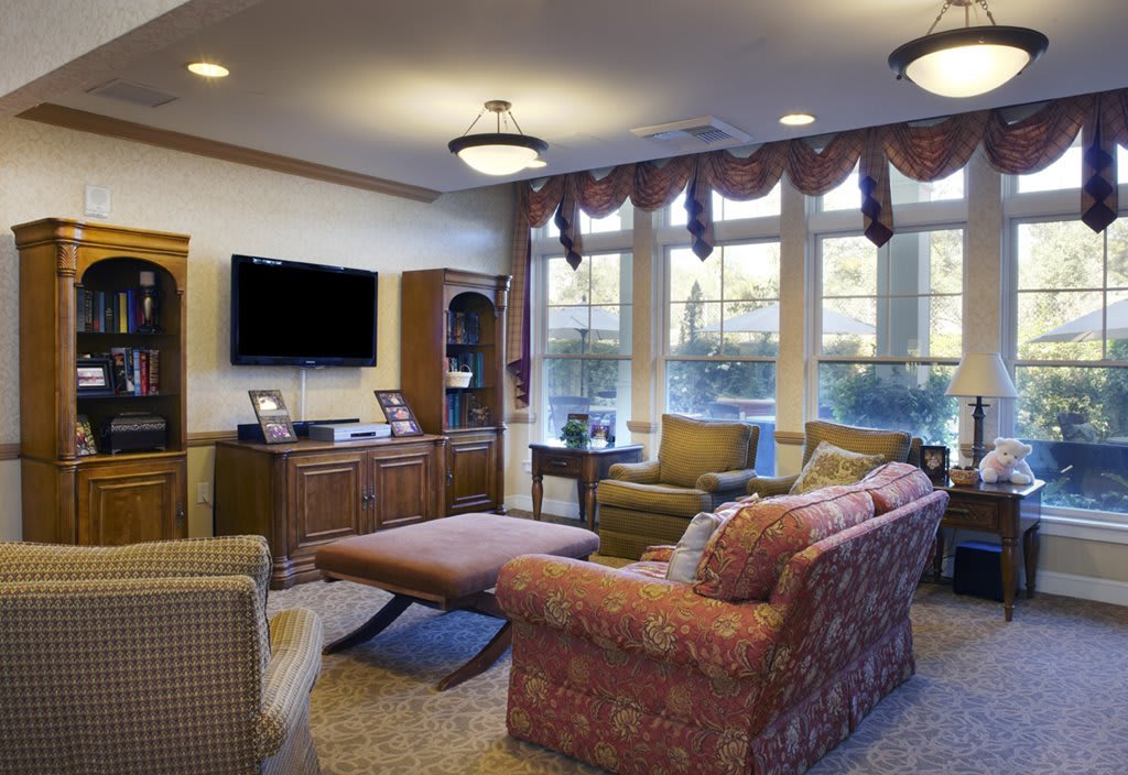 A cozy living room with comfortable seating and natural light.