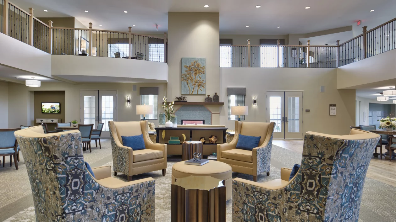 A modern and cozy living room with comfortable seating and elegant decor.