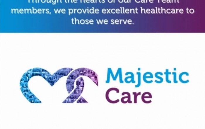 Majestic Care logo with a heart symbol and company name.