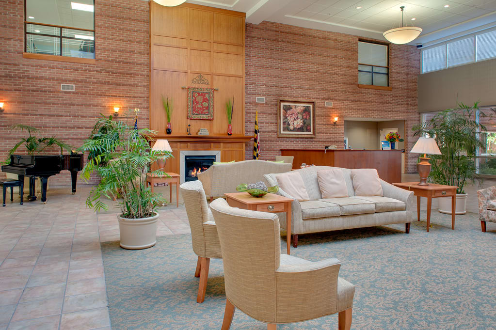 A spacious and modern lobby with comfortable seating and elegant decor.