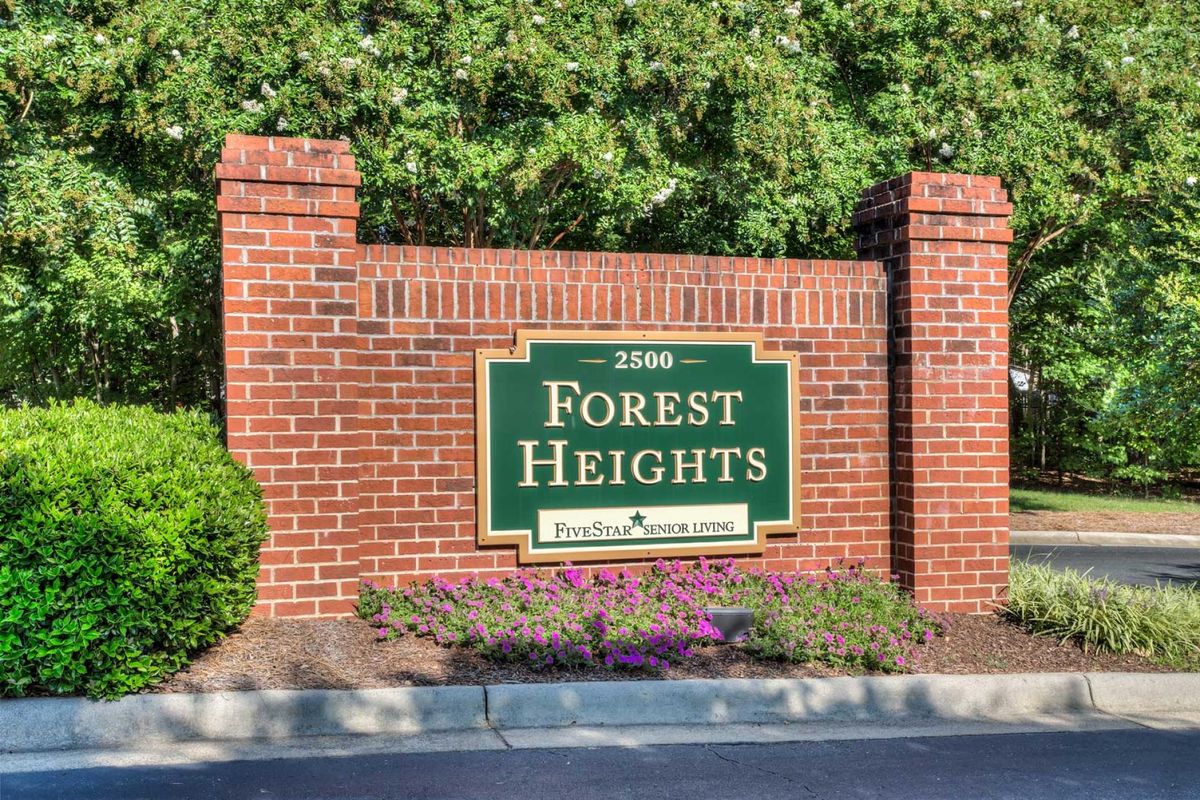 Entrance sign to Forest Heights neighborhood.