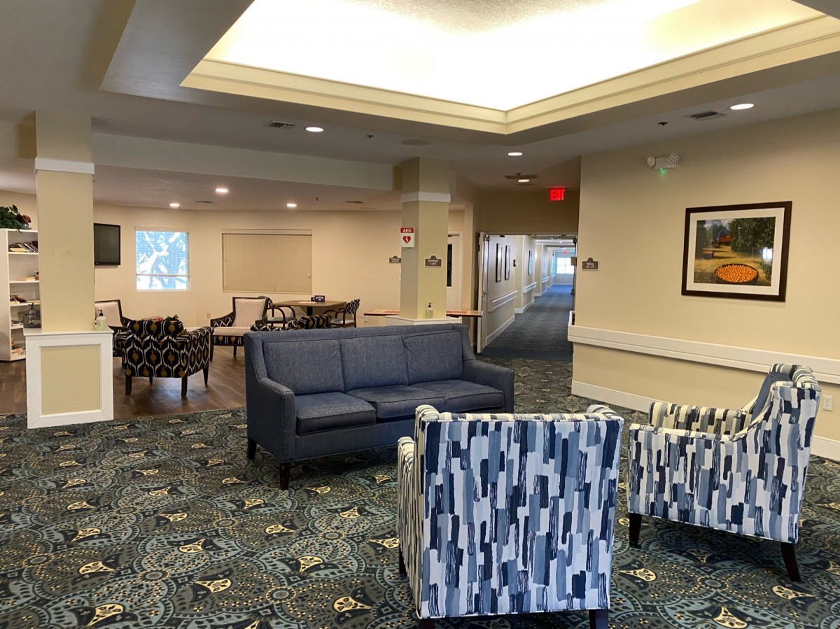 A cozy lobby area with comfortable seating and soft lighting.