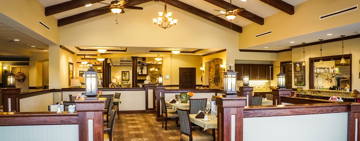 Elegantly designed restaurant interior with cozy seating and warm lighting.