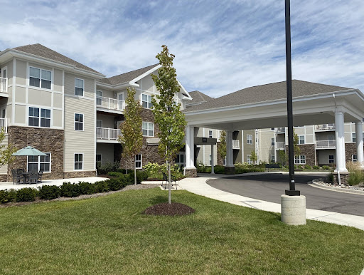 A modern residential complex featuring landscaped grounds and contemporary architecture.