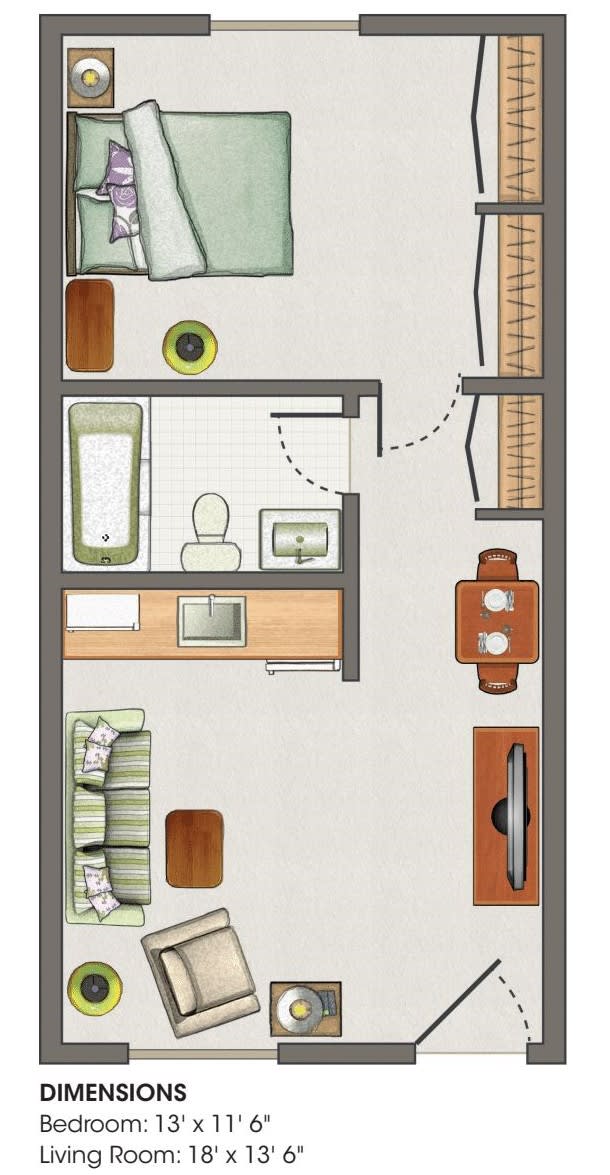 A compact floor plan featuring a bathroom, kitchen, and living area with furniture layout.