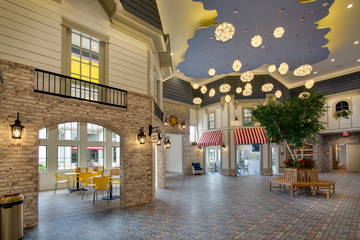 A stylish indoor space featuring modern architectural elements and unique lighting.