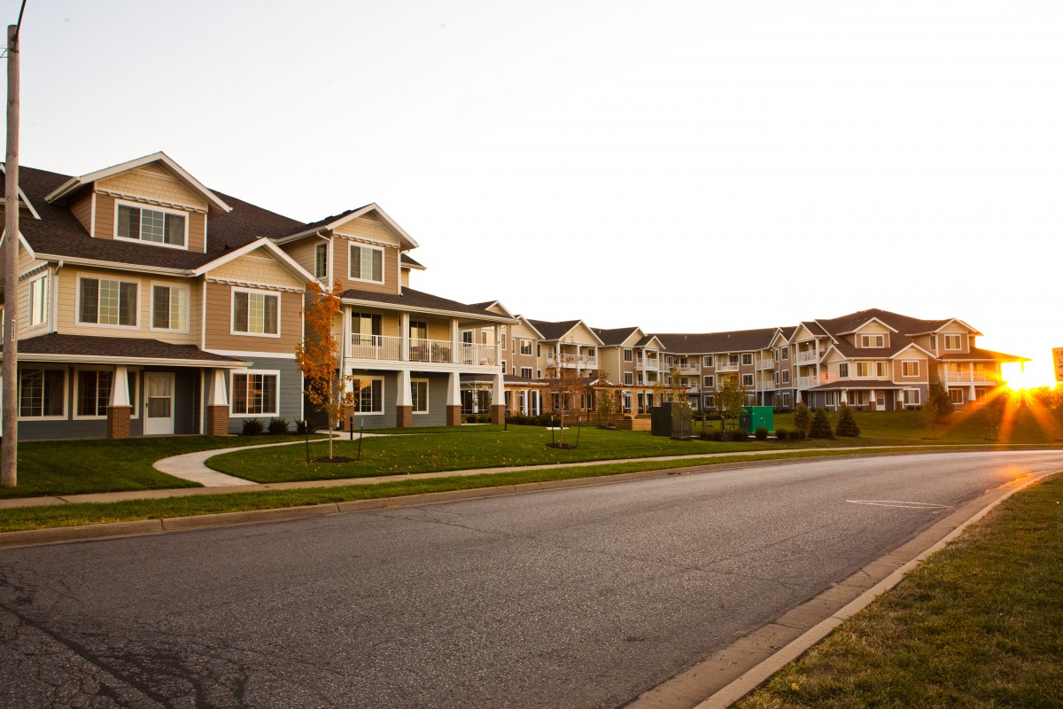 A picturesque suburban neighborhood with modern residential buildings.