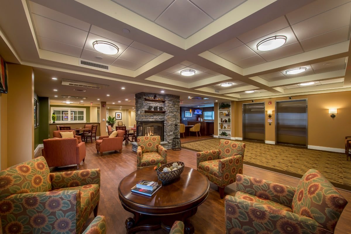 A cozy hotel lobby with comfortable seating and warm lighting.
