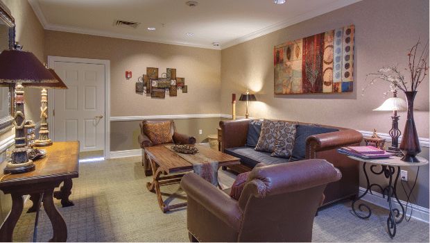 A cozy living room with comfortable seating and stylish decor.