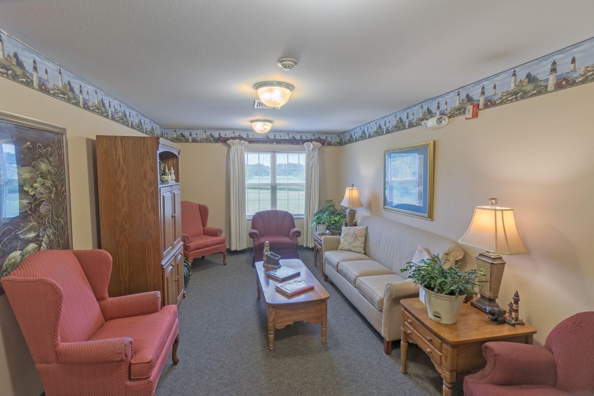 A cozy living room with classic furniture and decor.
