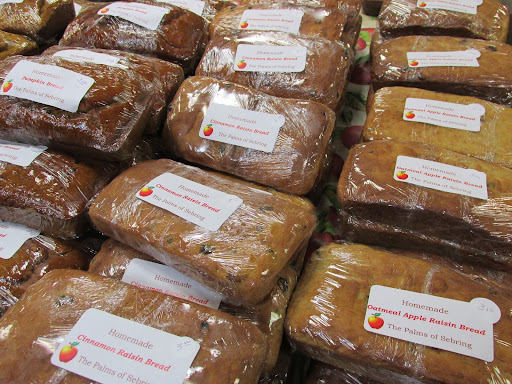 An array of packaged loaves of bread available in a bakery.
