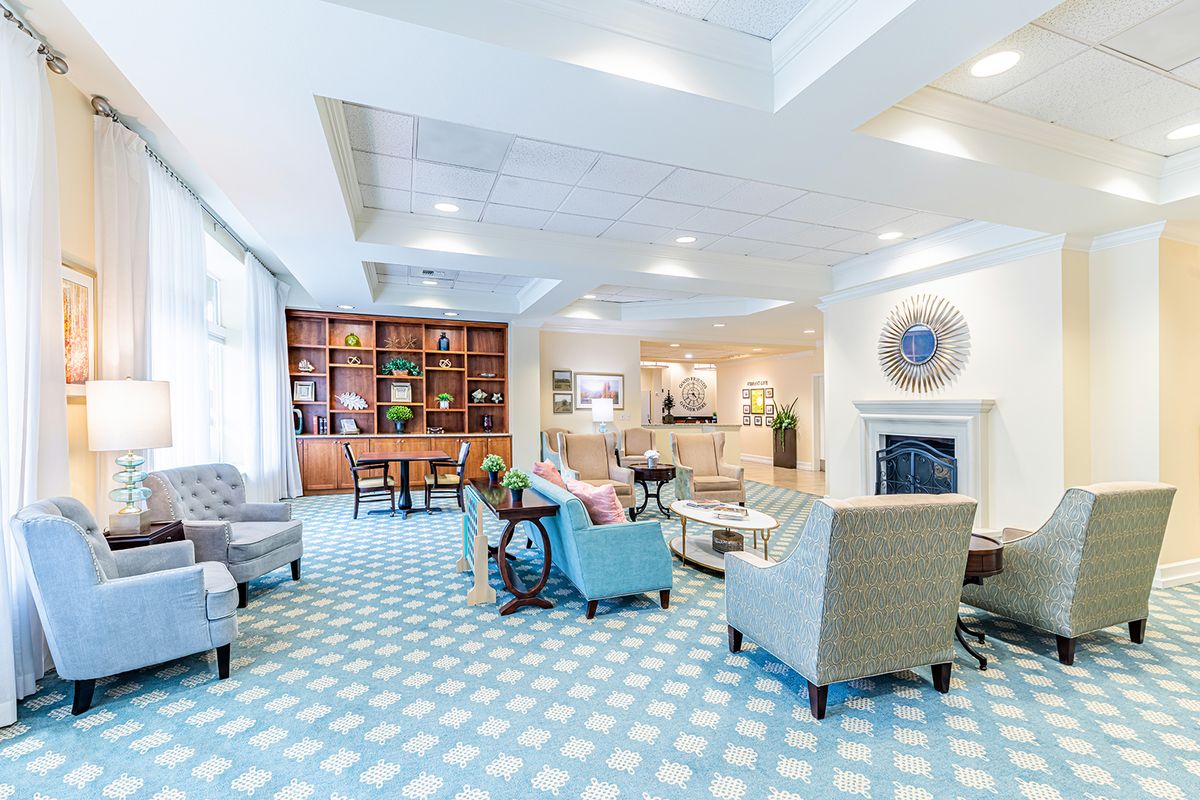 A bright and modern living room with comfortable seating and stylish decor.