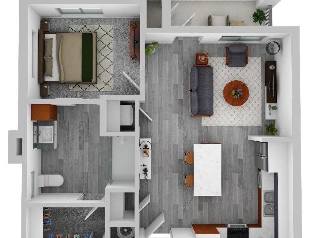 An overhead view of a modern apartment floor plan showcasing a living room, bedroom, and kitchen area.