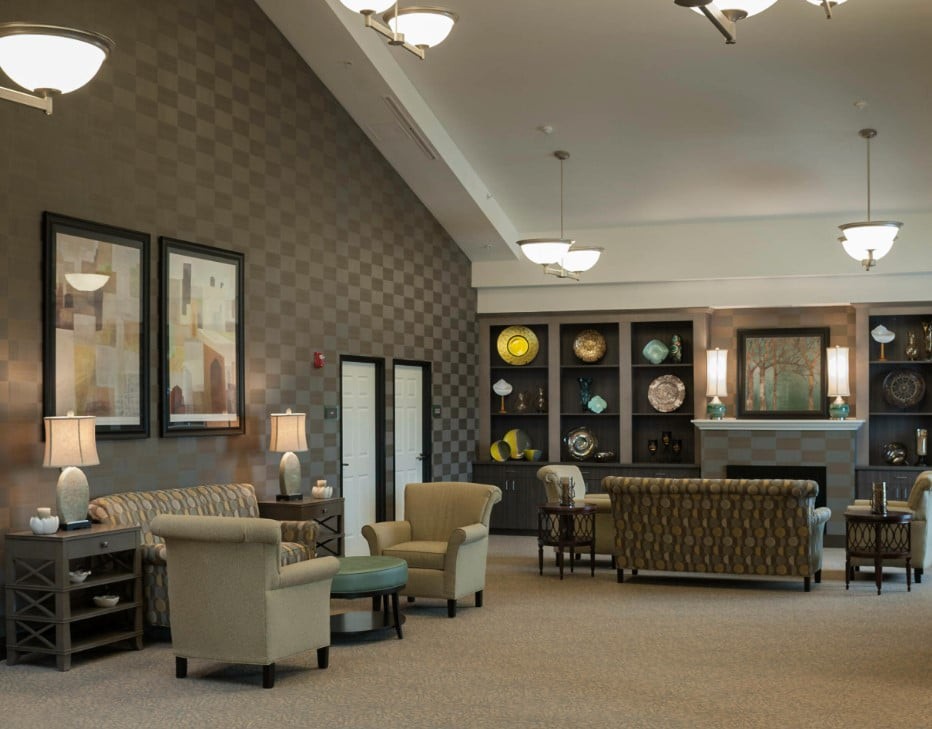 A modern lounge with comfortable seating and stylish decor.