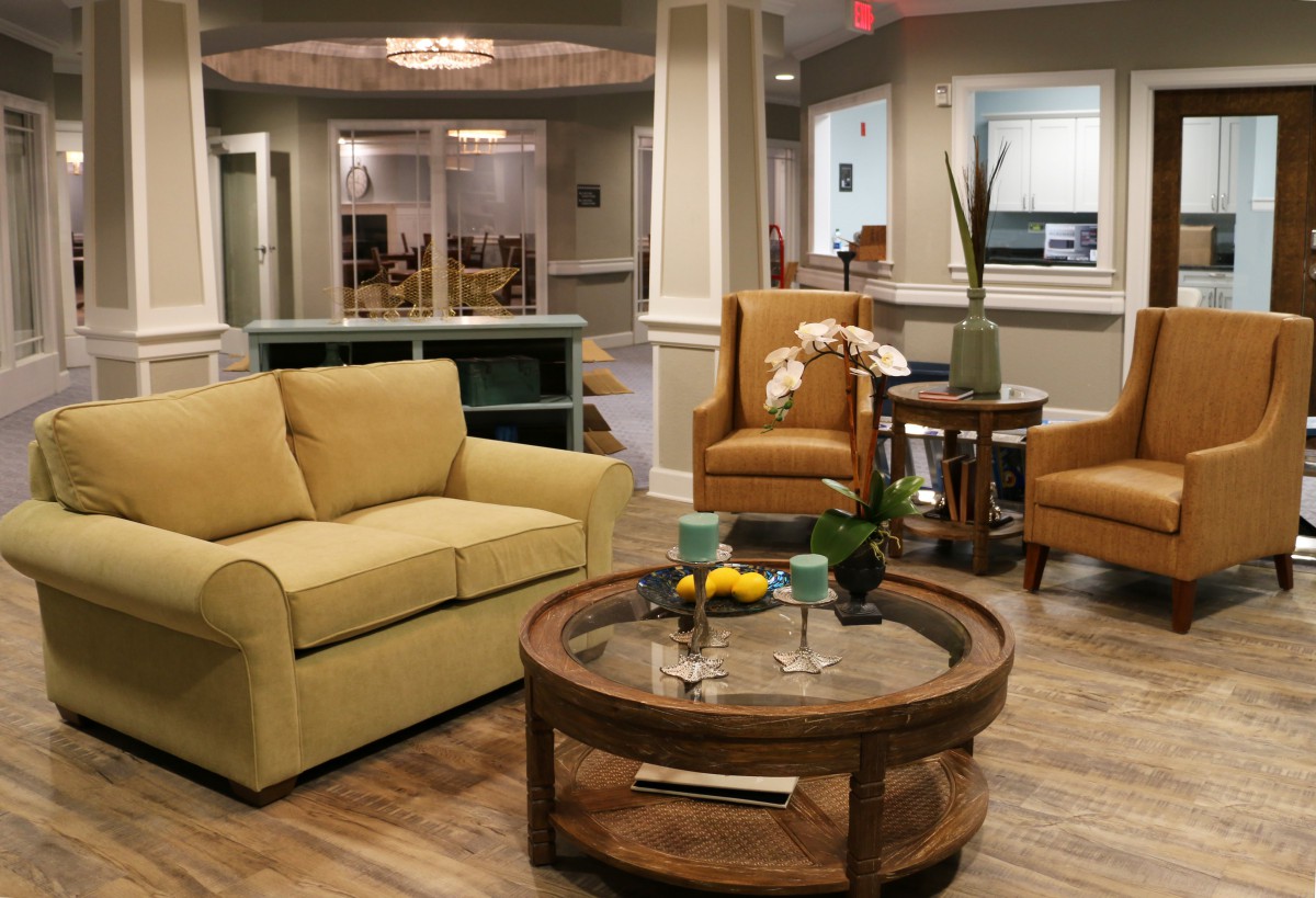 A cozy lounge area with comfortable seating and a coffee table.