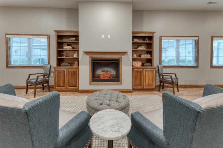 Cozy living room with a fireplace and comfortable seating.