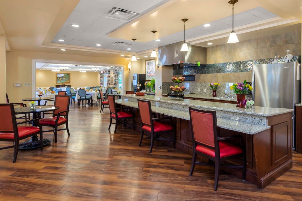 A spacious dining area with elegant decor and comfortable seating.