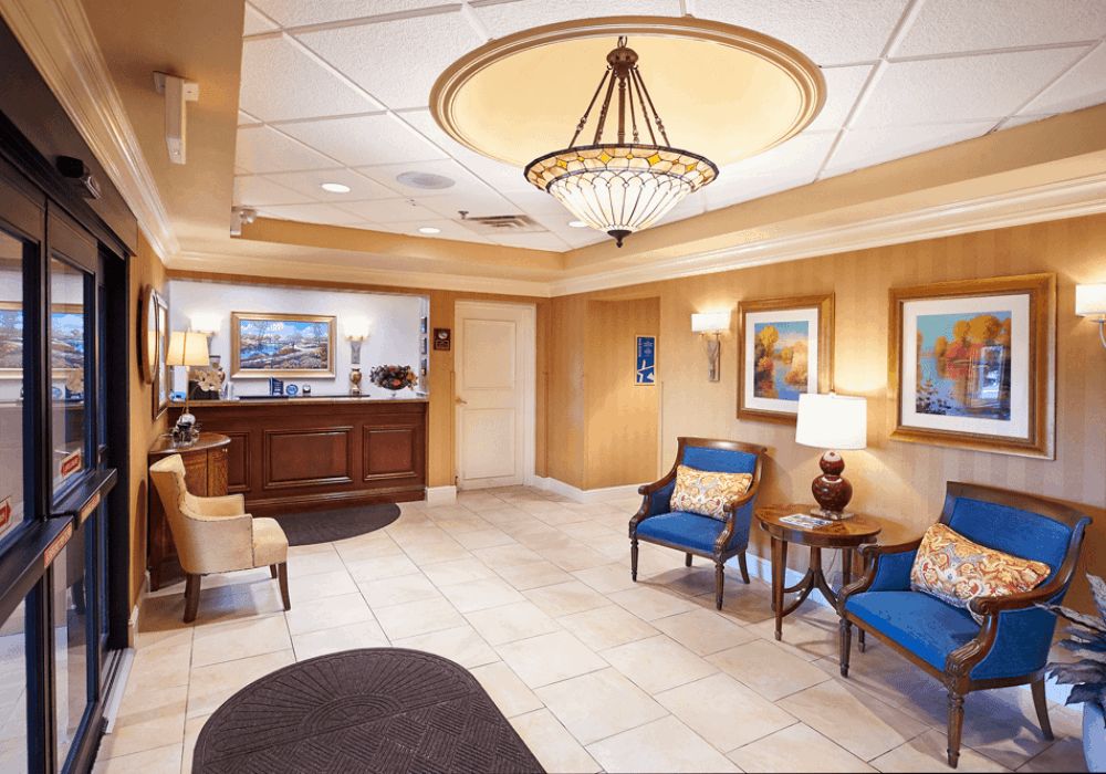 An elegant lobby with comfortable seating and warm lighting.