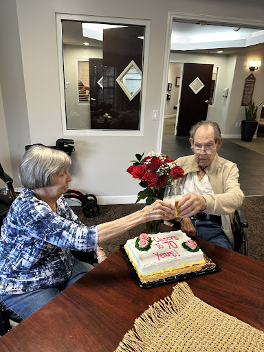 A joyful celebration with a birthday cake and roses, bringing together cherished moments.