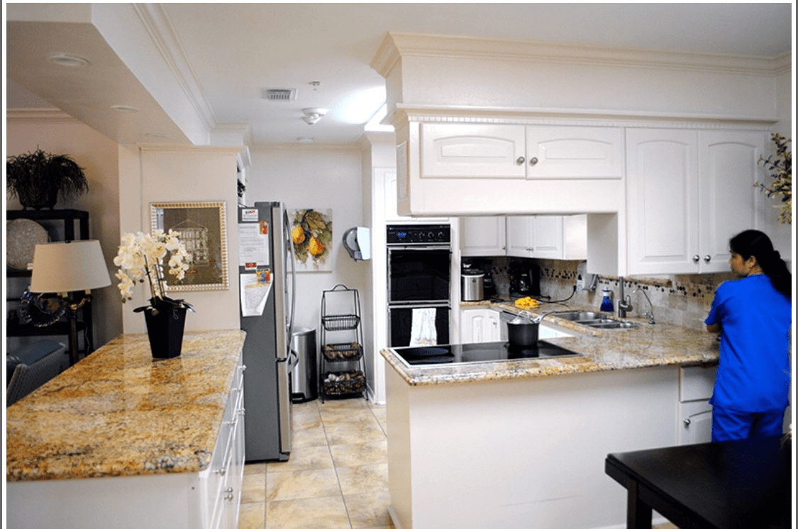 A modern kitchen with sleek appliances and elegant decor.