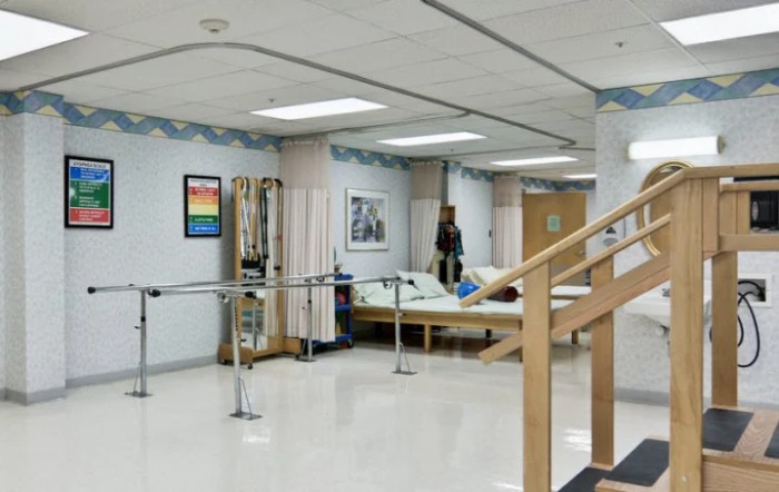 A hospital rehabilitation area equipped for physical therapy exercises.