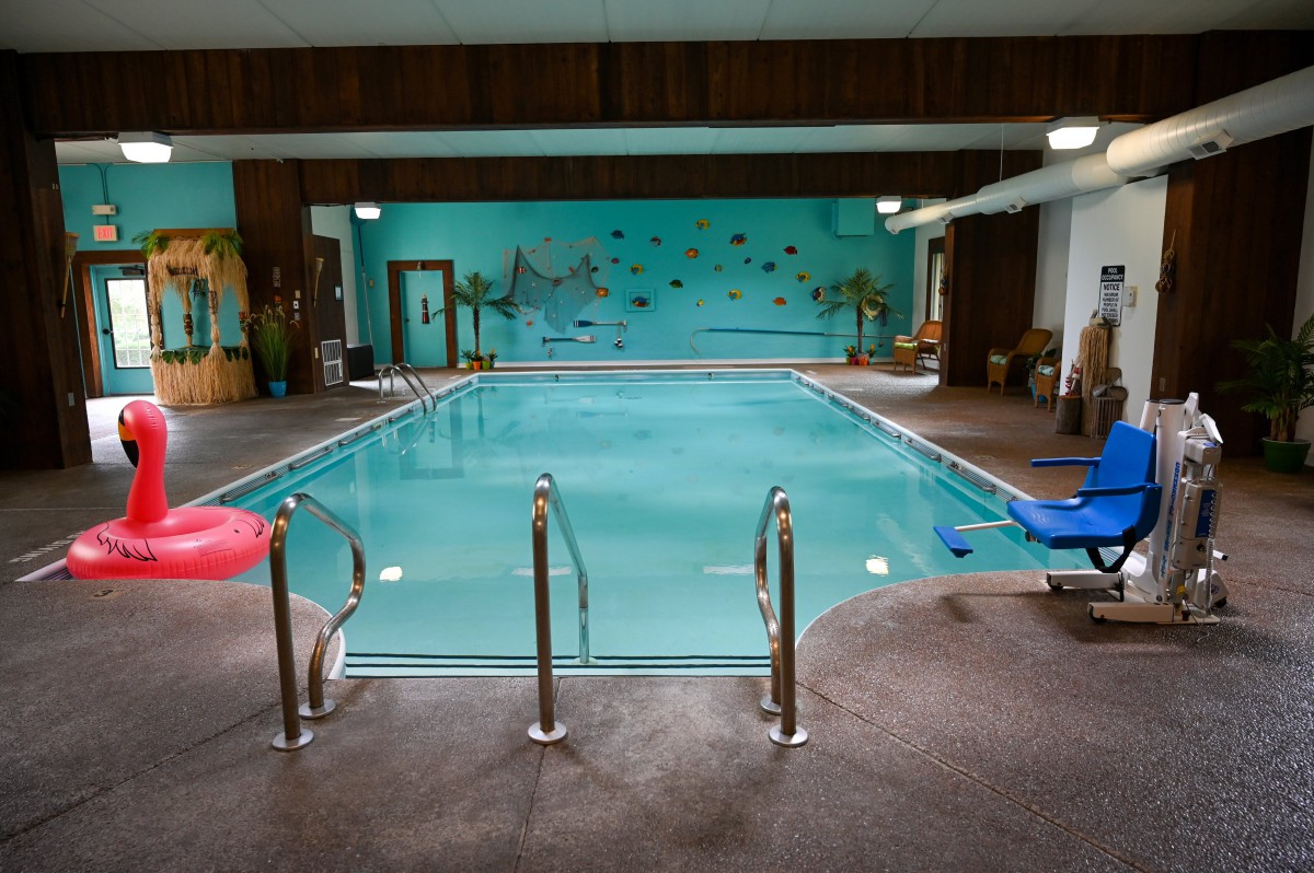 An indoor swimming pool with a clean and inviting atmosphere, perfect for recreational activities.