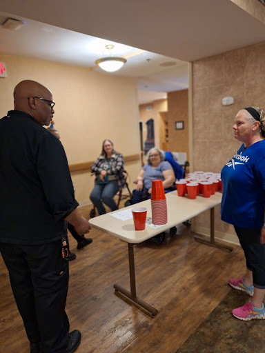 A lively community event where participants engage in an interactive game.