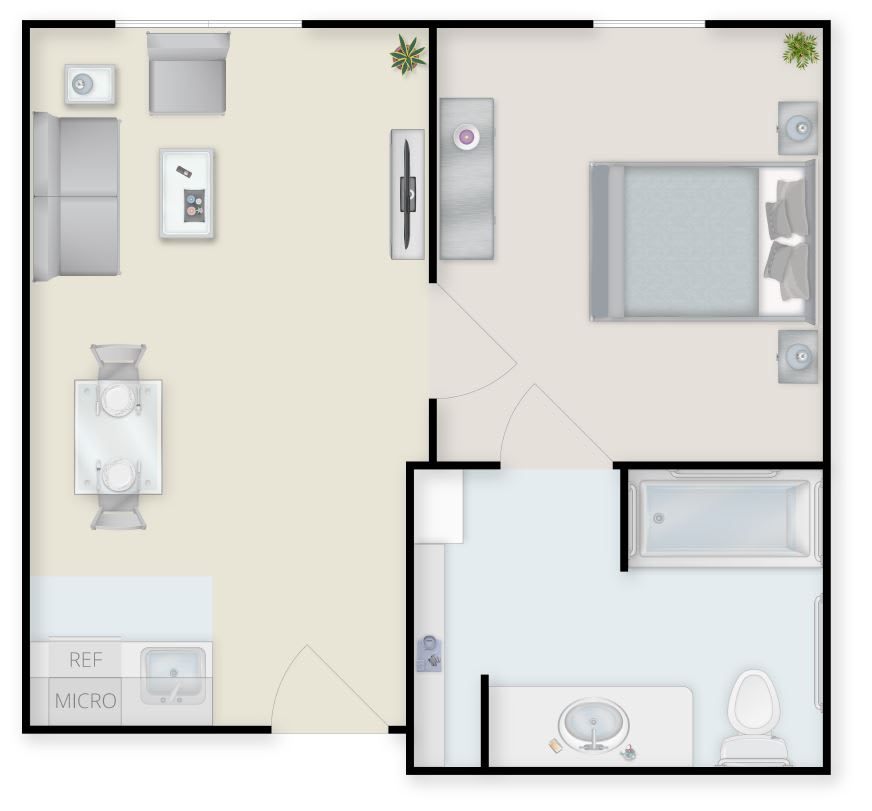 A floor plan of a one-bedroom apartment layout featuring a kitchen, living room, bedroom, and bathroom.