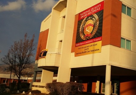 A building showcasing a large banner for the National Guard.