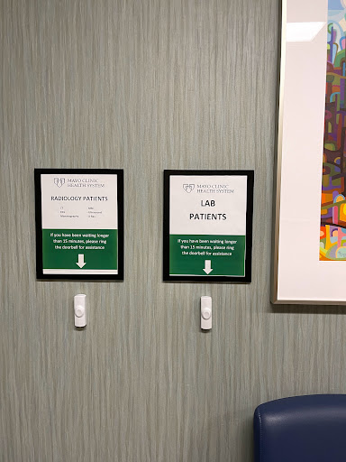 Signs providing information for patients in a healthcare setting.