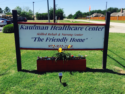 The Kaufman Healthcare Center sign, promoting their services as a friendly home for rehabilitation and senior care.