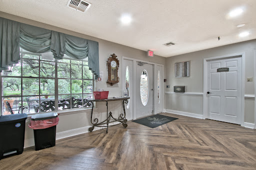 A welcoming entryway featuring stylish decor and natural light.