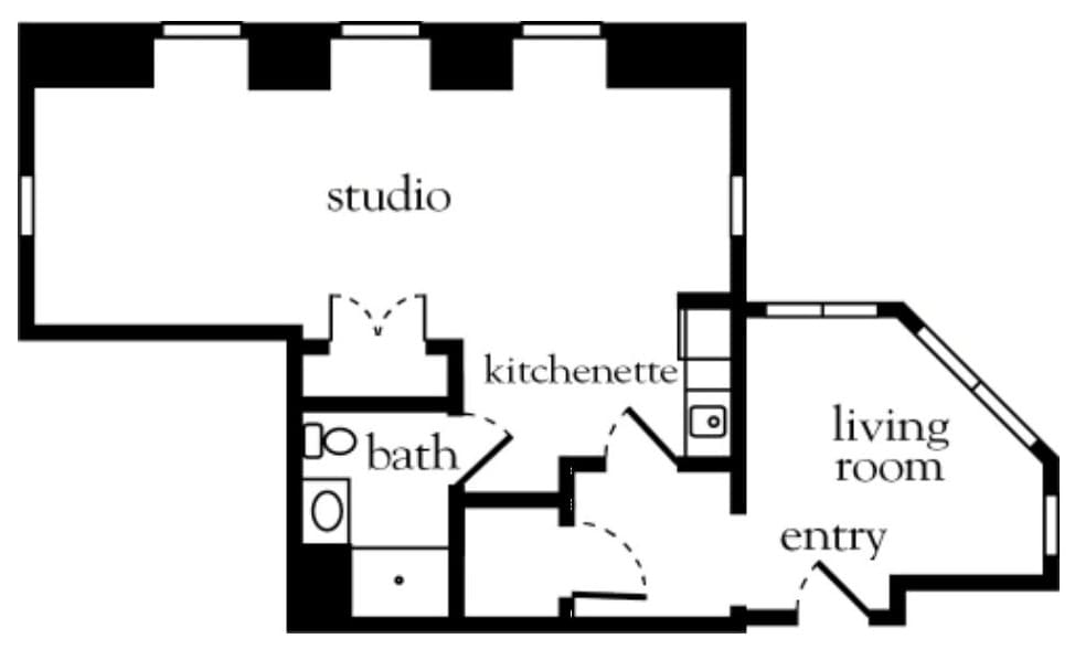 Studio apartment floor plan with a kitchenette and bathroom.