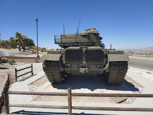 A military tank displayed outdoors, showcasing its armored exterior.