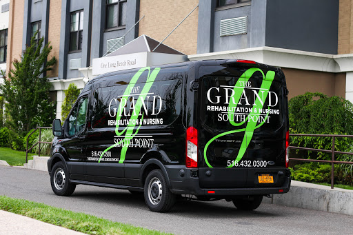 A branded van showcasing a business logo and contact information.