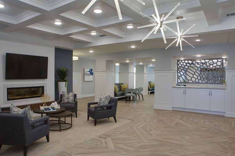 A modern lobby area featuring contemporary furniture and stylish lighting.