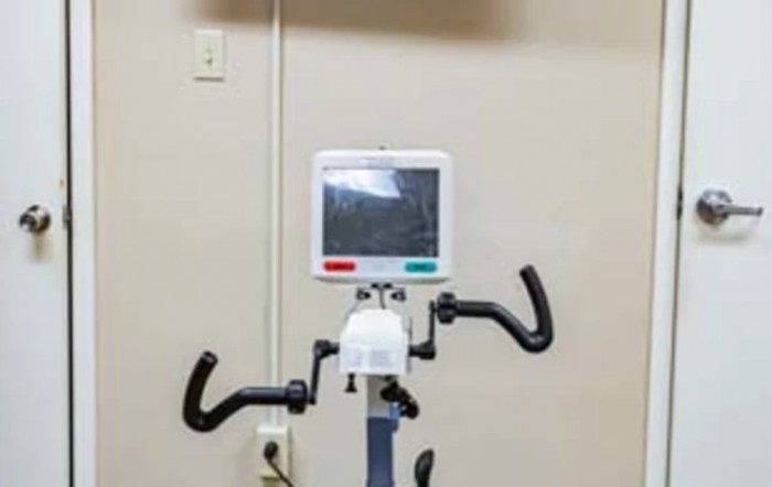 A stationary exercise bike in a gym setting.