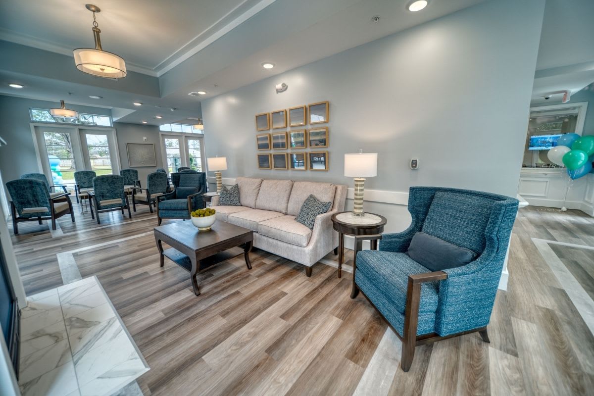 A modern living room with comfortable seating and stylish decor.