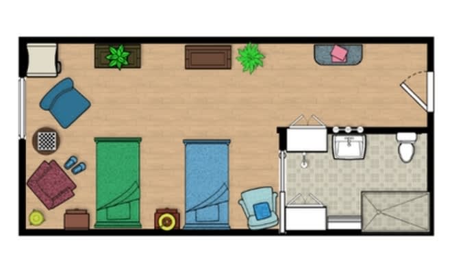 A simple floor plan featuring a bedroom with two beds, a small living area, and a kitchenette.