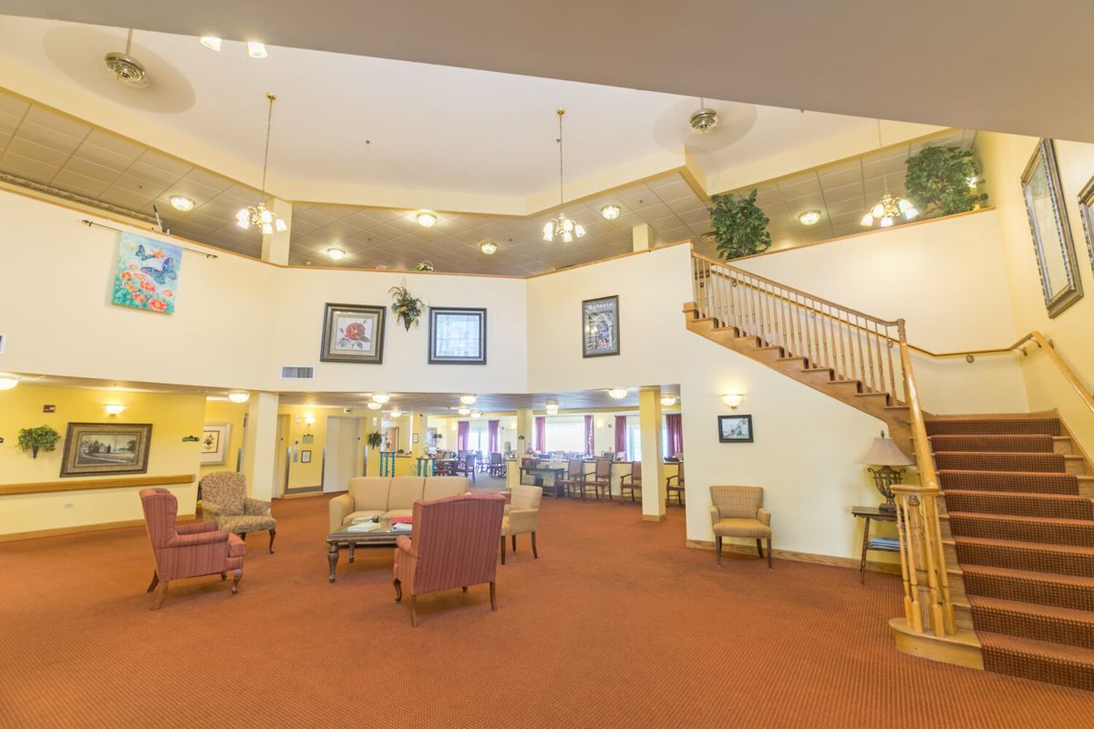 Spacious lobby with comfortable seating and elegant lighting.