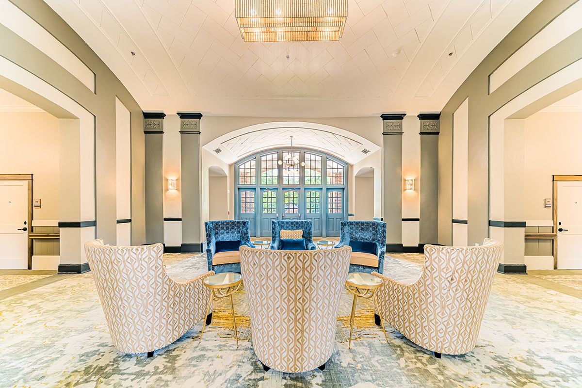 A luxurious lounge area with elegant seating and modern design elements.